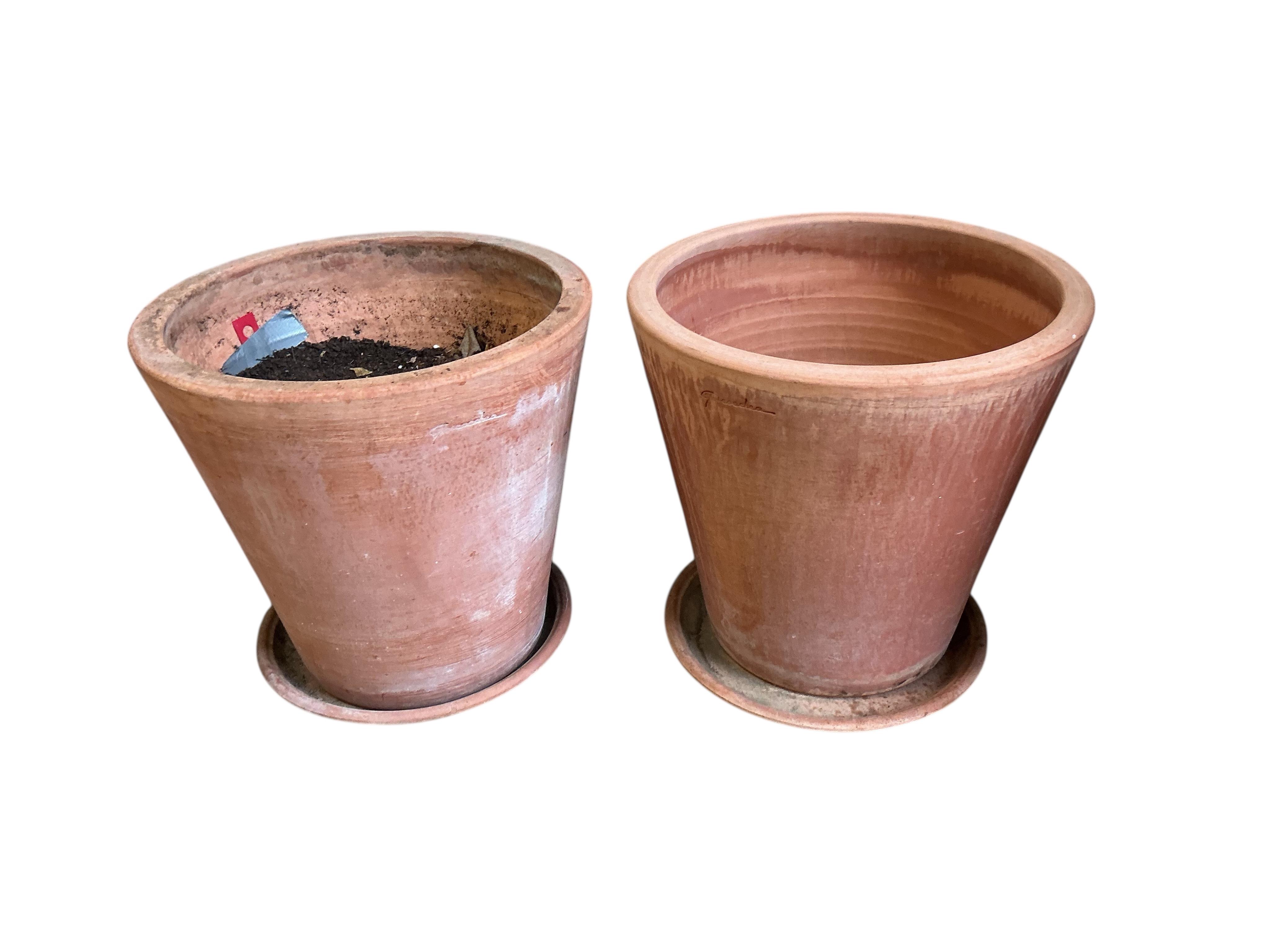 A pair of Goicoechea circular pottery planters with tray bases, diameter 39cm, height 38cm